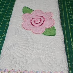 White Quilted Blanket with Pink Flower Appliqué